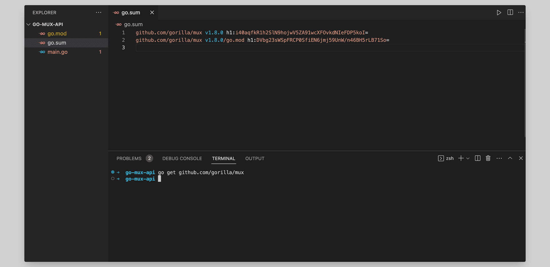 Editor showing the go.sum file after running go get for the gorilla/mux package in the terminal